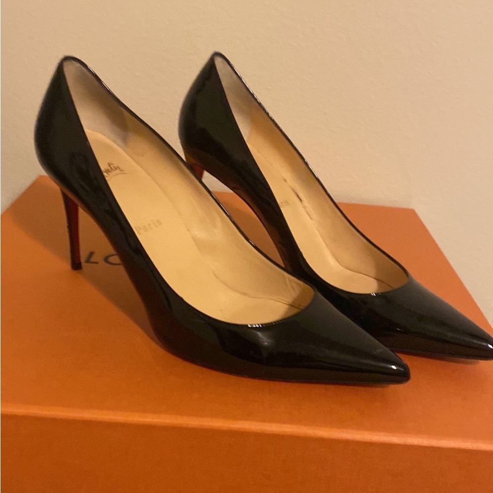 Christian Louboutin
So Kate Patent Pointed-Toe Red Sole Pump black